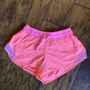 Orange LULULEMON shirts